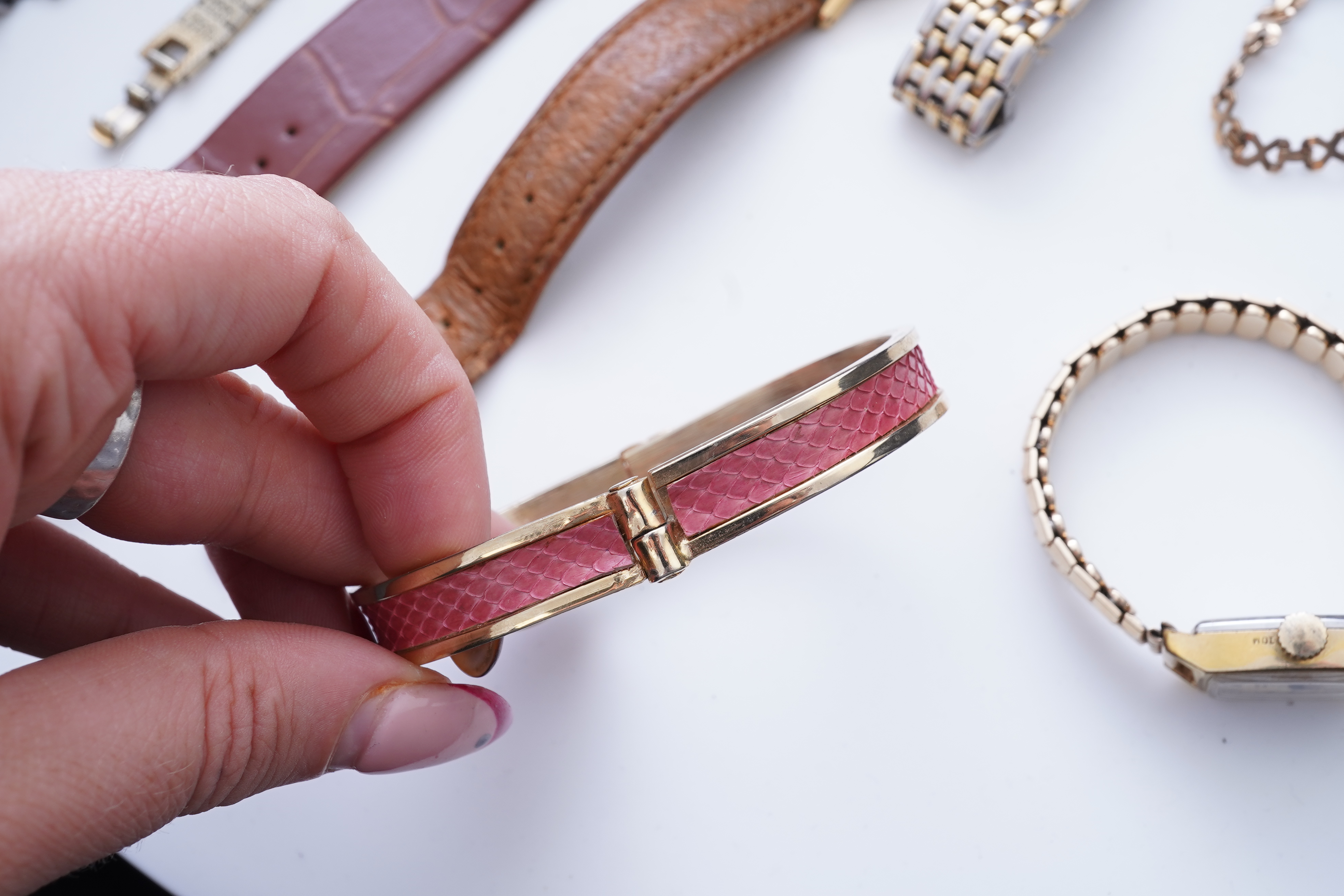 XX REMOVE ROLEX XX, A collection of watches and a bangle, comprising: two Seiko quartz watches; a manual winding watch by Larex; a quartz watch by Eterna; a quartz watch by Rotary; and a quartz watch by Pulsar; together